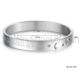 Braccialetti Di Coppia "Footrints Of Love" In Tatanium Con Impronte Di Piedi Cave E Strass C850